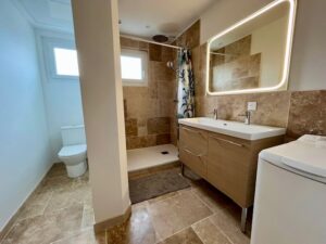 Salle de bains travertin rénovation mercier seignosse